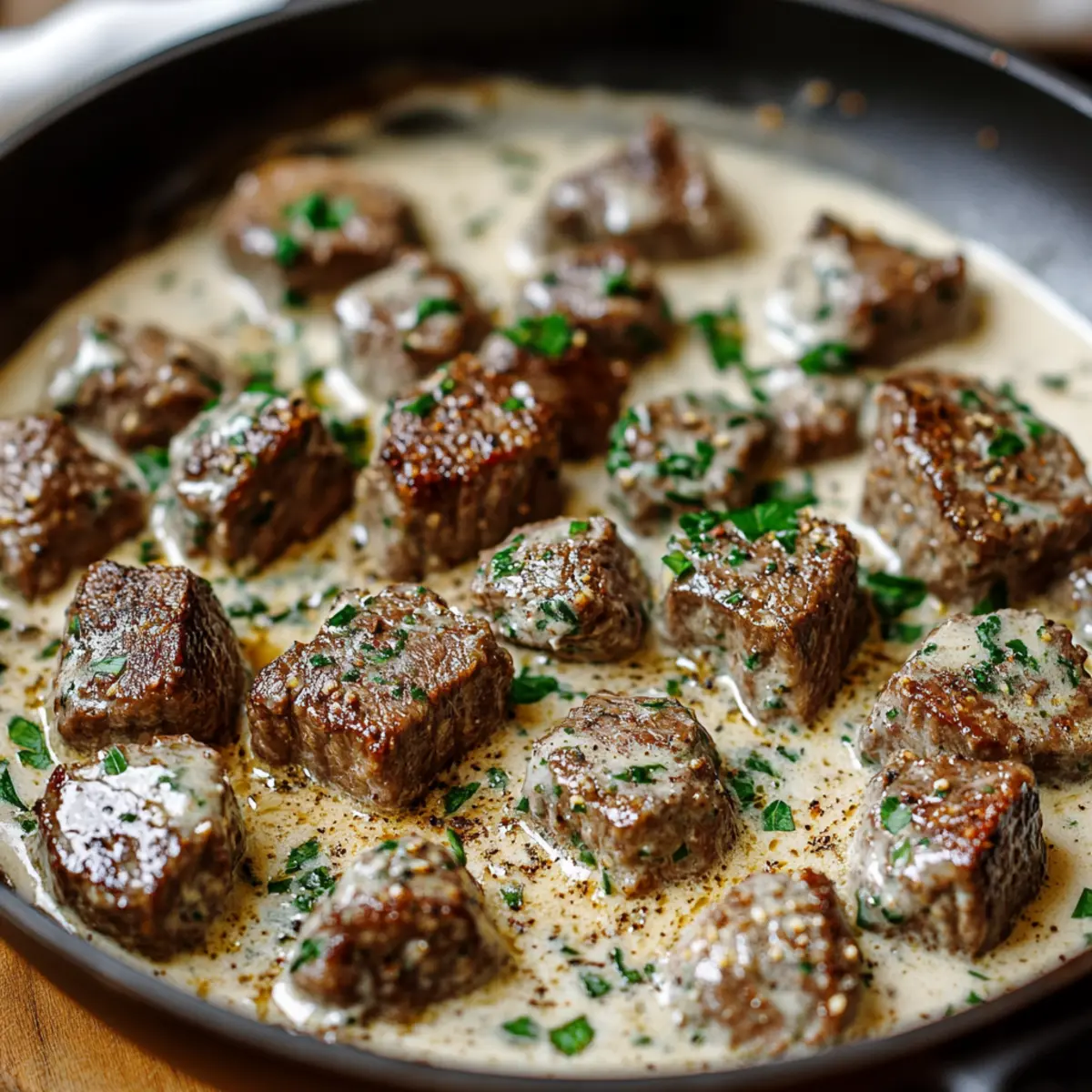 Tender Garlic Butter Steak Bites in Parmesan Cream Sauce